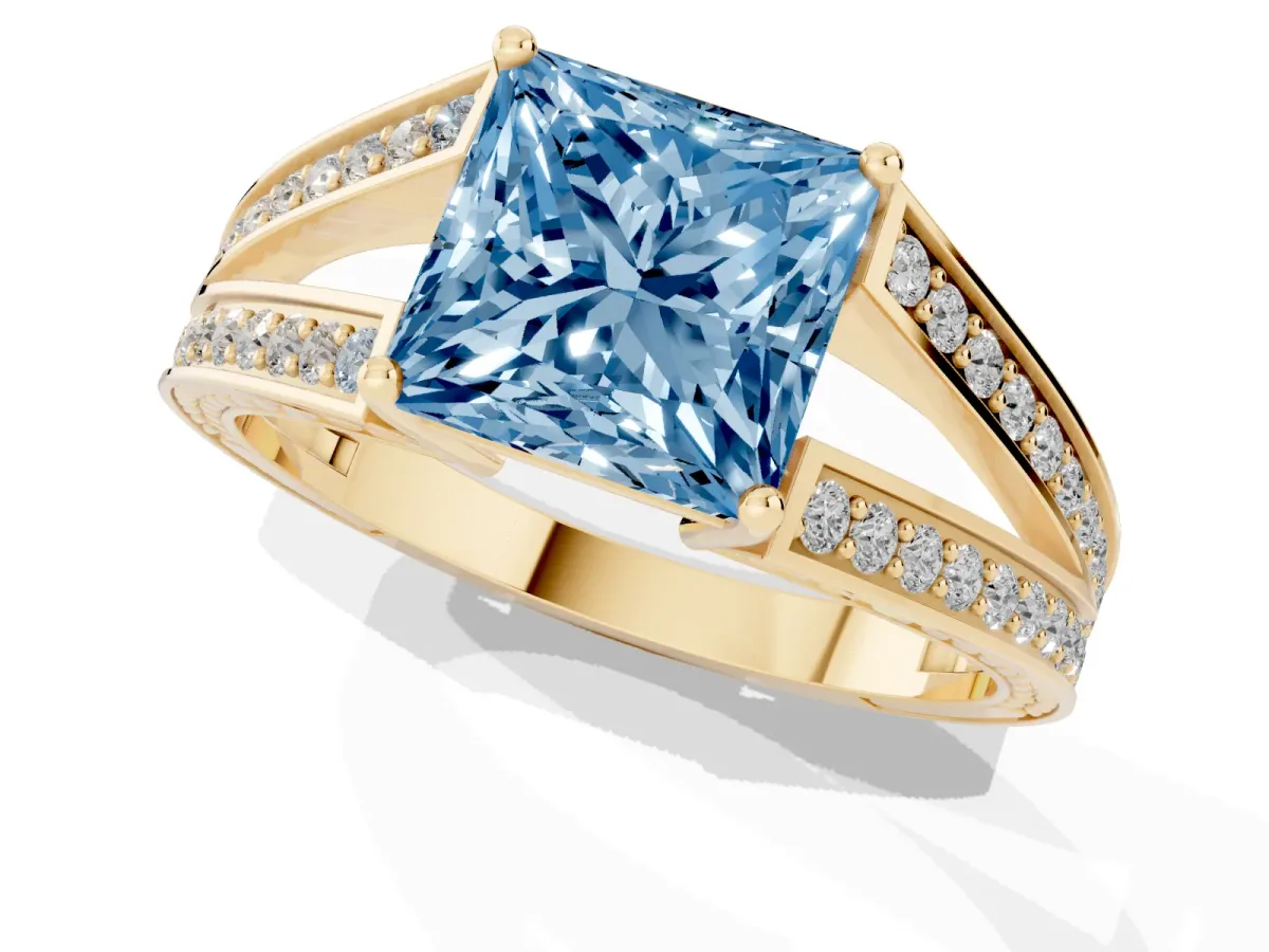 Fancy Blue Princess Cut Diamond Split Shank Ring with Pavé Band and Four-Prong Setting Yellow gold