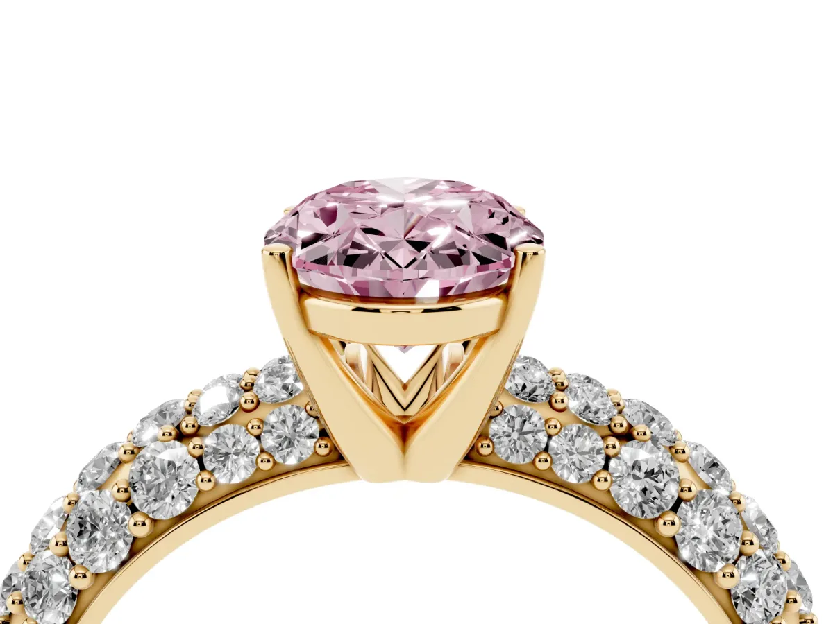 Fancy Pink Oval Cut Diamond Pavé Band Solitaire Ring with Four-Prong Setting Yellow gold
