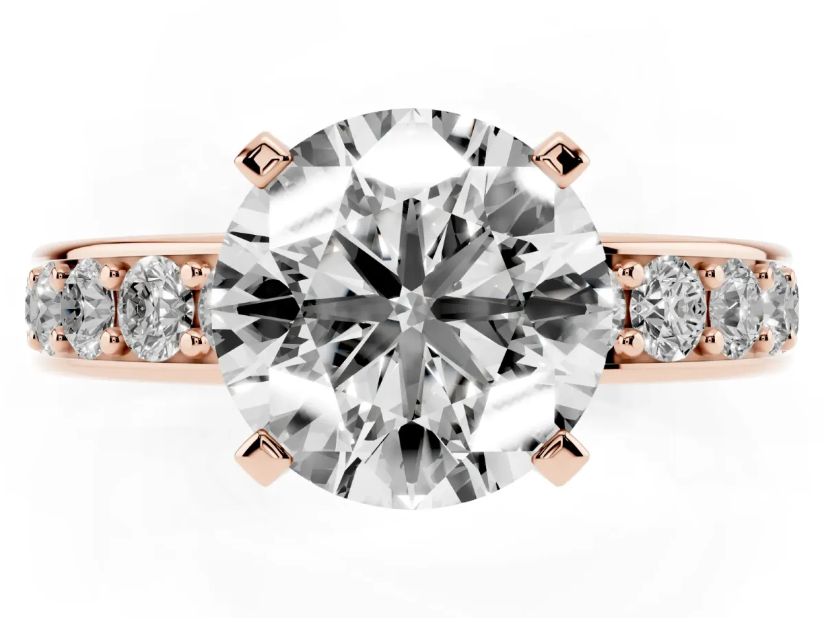 Round Cut Diamond Engagement Ring with Channel Set Round Band and Prong Setting Rose gold