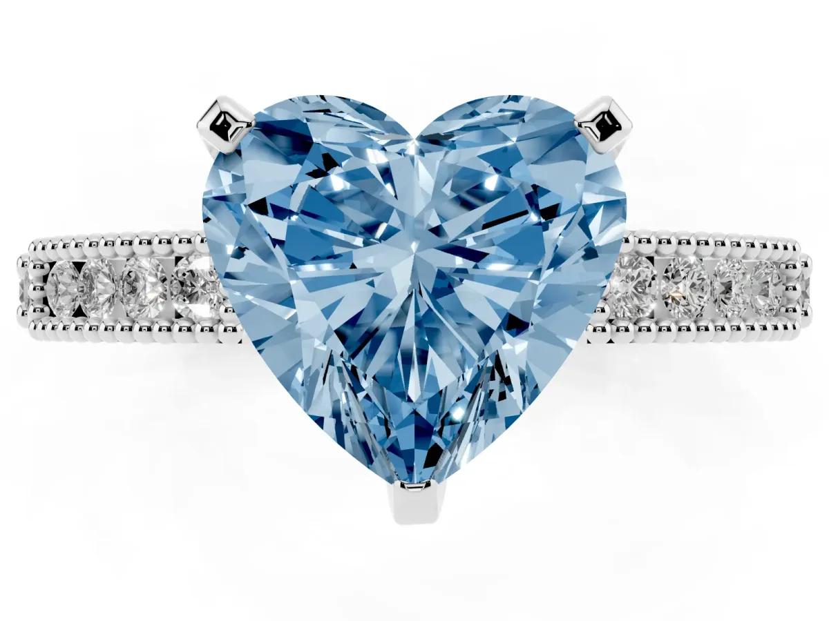 Fancy Blue Heart Cut Solitaire with Pavé Band and Four-Prong Setting Silver