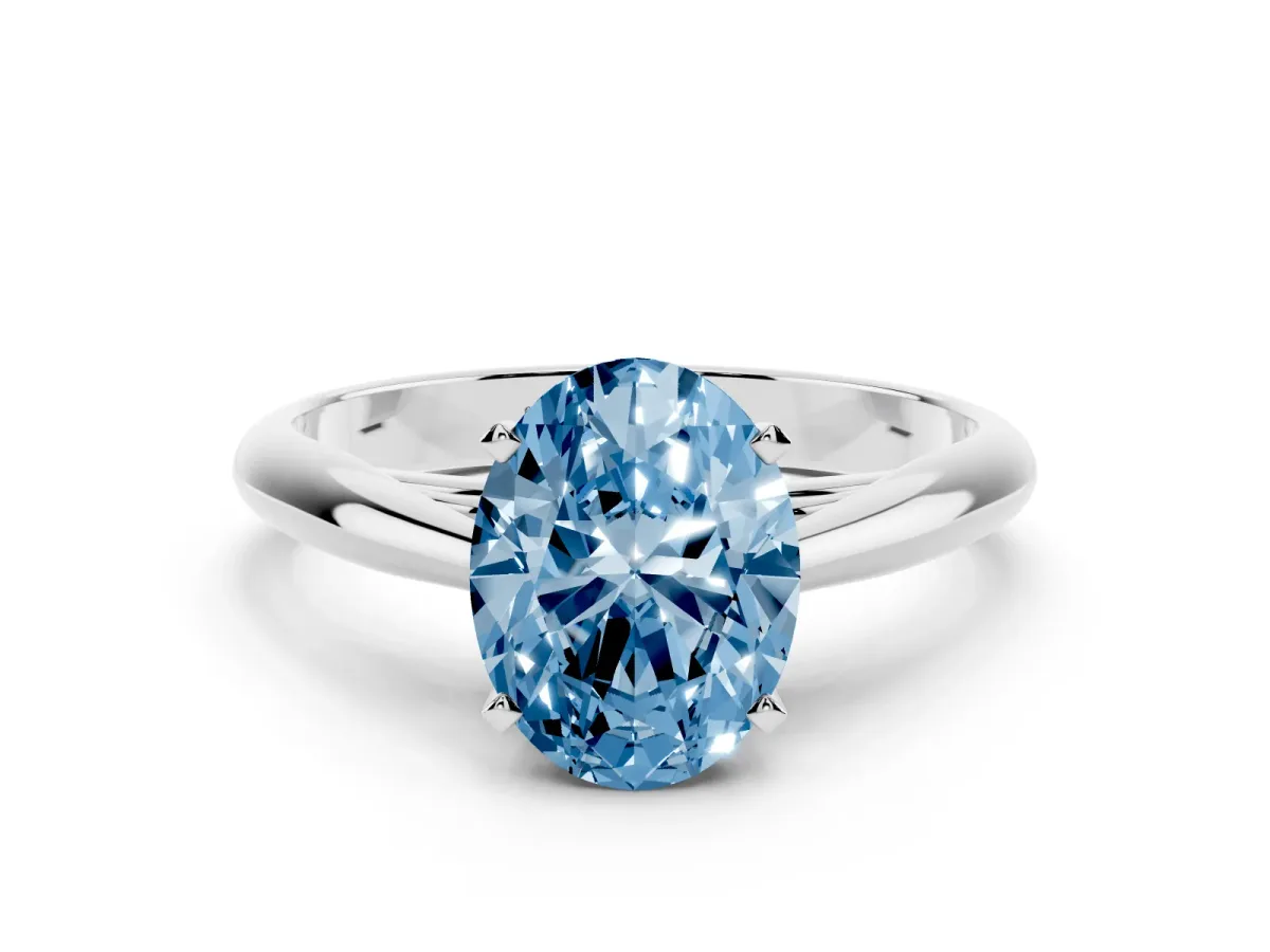 Fancy Blue Oval Cut Diamond Solitaire Engagement Ring with Cathedral Setting and Four-Prong Mount Silver