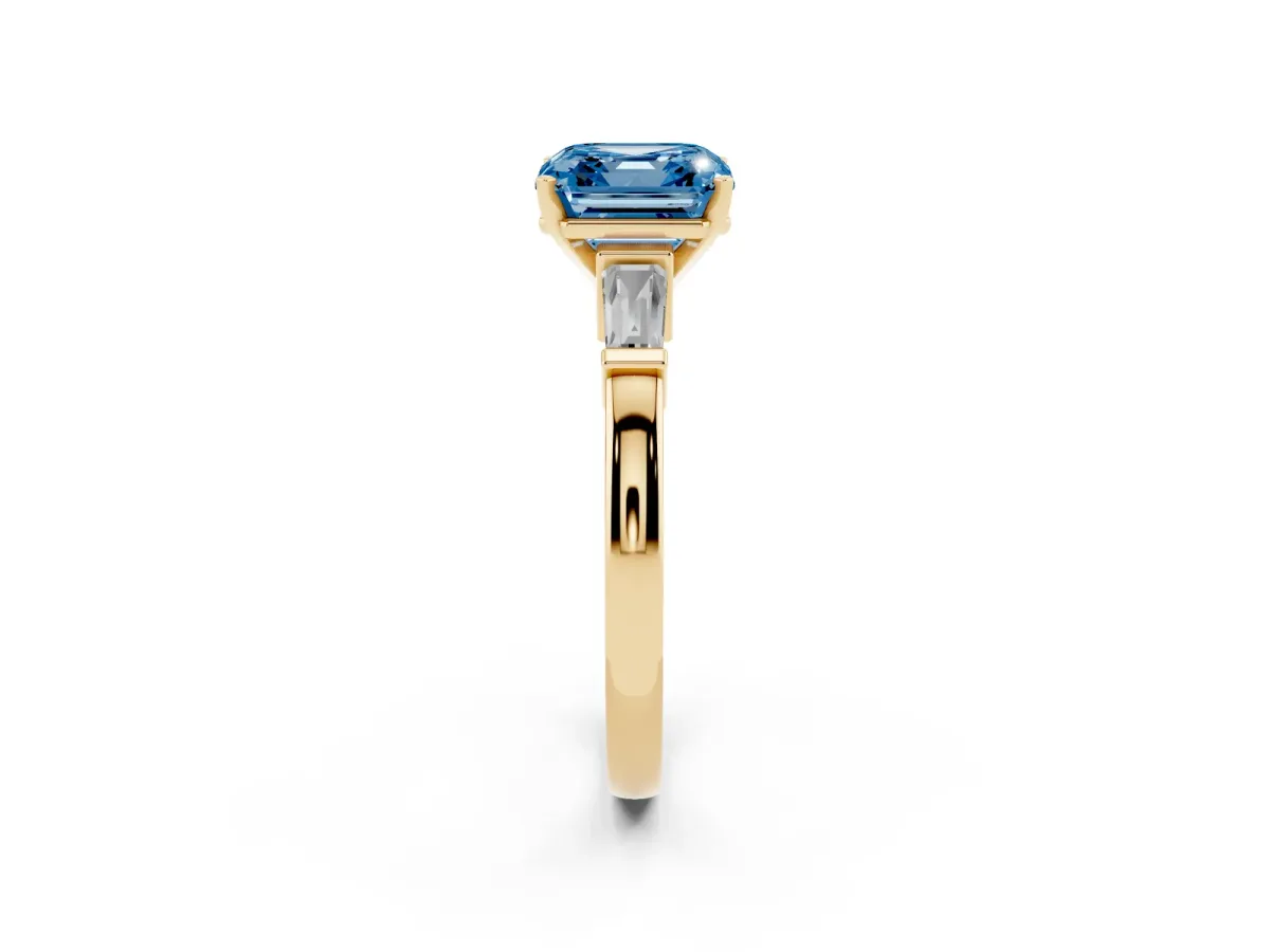 Fancy Blue Asscher Cut Cut Diamond Solitaire Ring with Tapered Baguette Accents and Four-Prong Setting Yellow gold