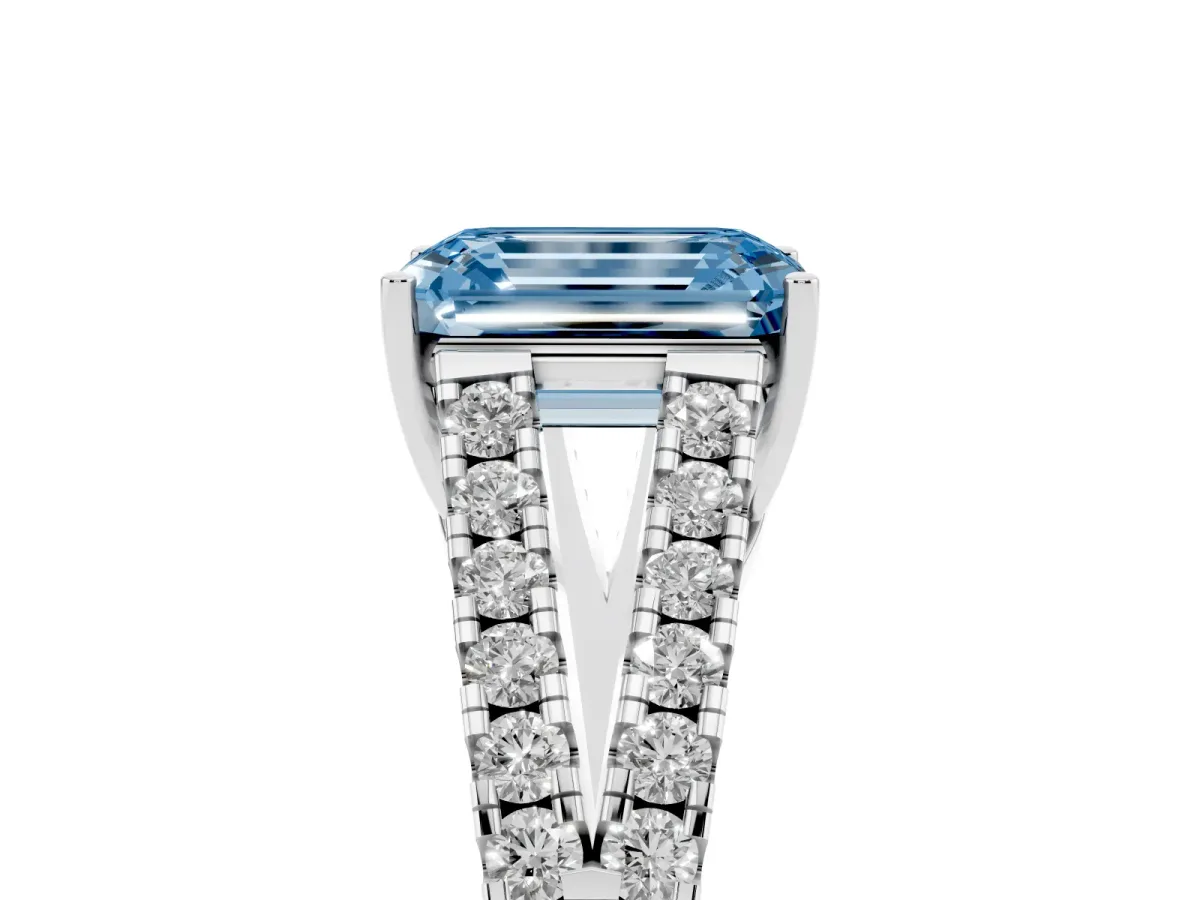 Fancy Blue Emerald Cut Diamond Split Shank Pavé Engagement Ring with Four-Prong Setting Silver