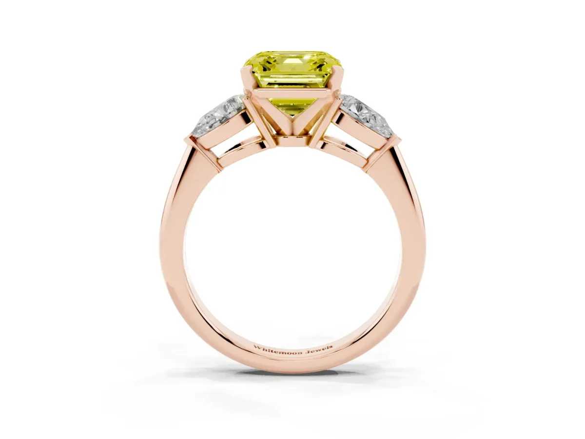 Fancy Yellow Three-Stone Asscher Cut Diamond Ring with Pear Side Stones and Four-Prong Setting Rose gold
