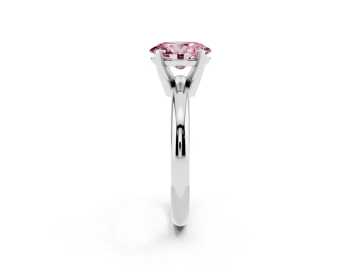 Fancy Pink Oval Cut Diamond Solitaire Engagement Ring with Round Band and Four-Prong Setting Platinum
