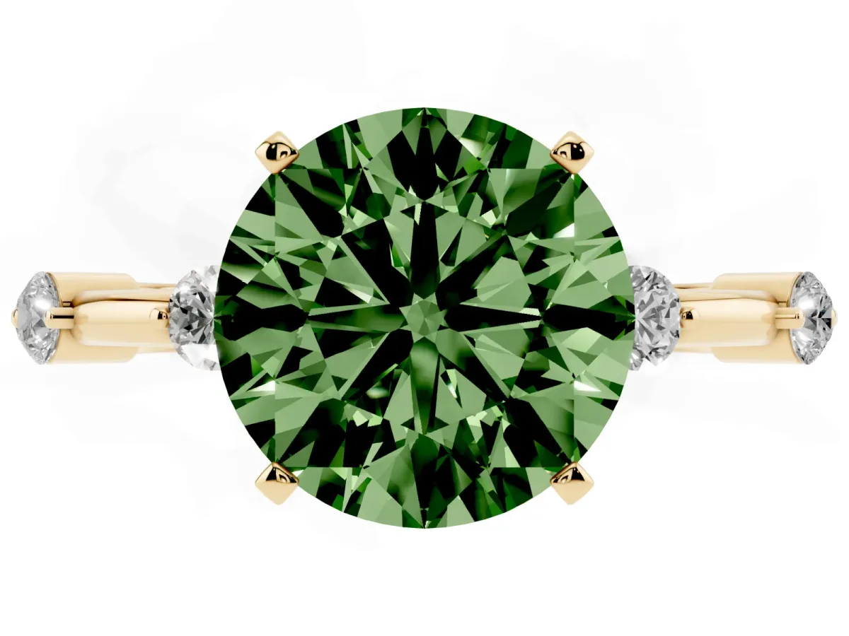 Fancy Green Round Cut Solitaire Diamond Ring with Bezel Set Side Stones and Prong Setting Yellow gold