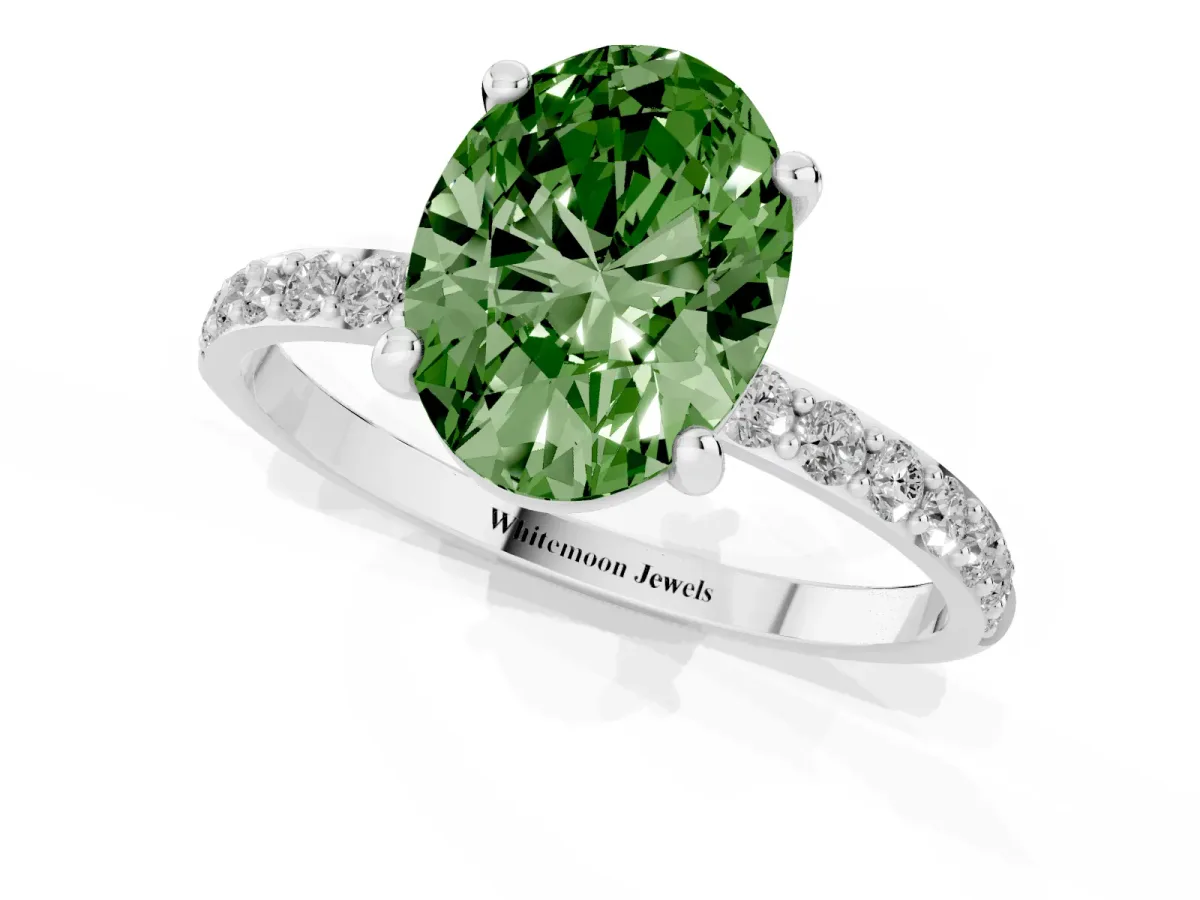 Fancy Green Oval Cut Diamond Solitaire Ring with Round Pavé Band and Prong Setting Silver