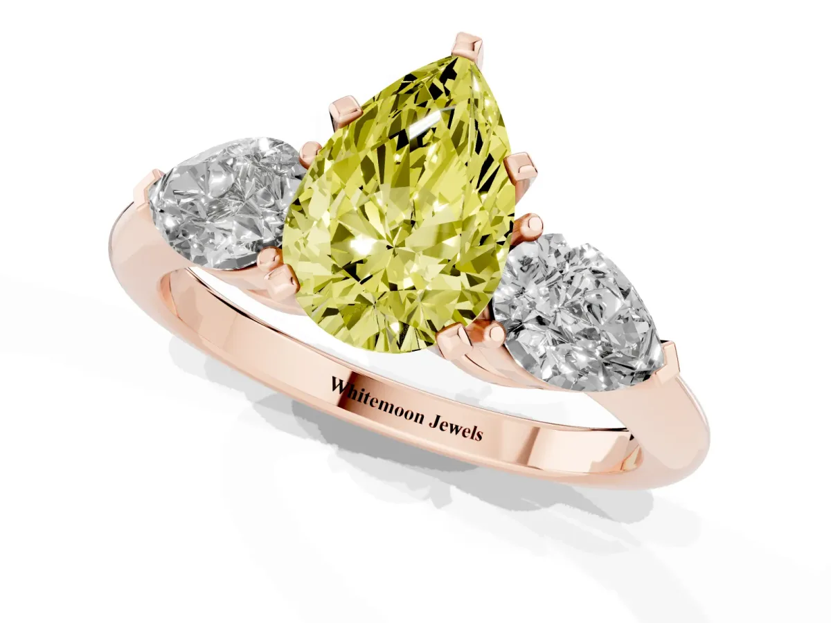 Fancy Yellow Three-Stone Pear Cut Diamond Ring with Pear Side Stones and Four-Prong Setting Rose gold