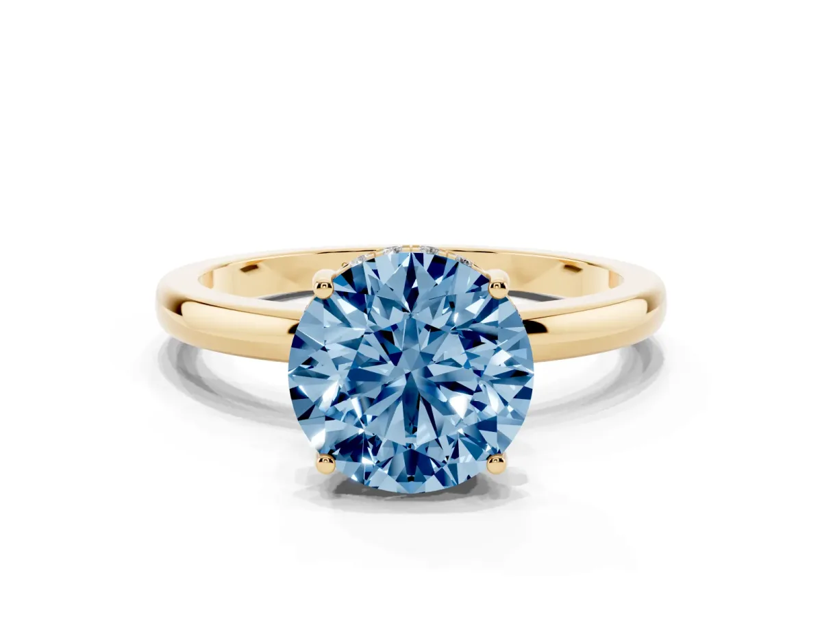 Fancy Blue Round Cut Solitaire Diamond Ring with Prong Setting and Plain Band Yellow gold