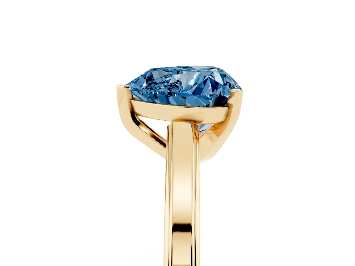 Fancy Blue Heart Cut Solitaire Diamond Ring with Four-Prong Setting and Classic Band Yellow gold