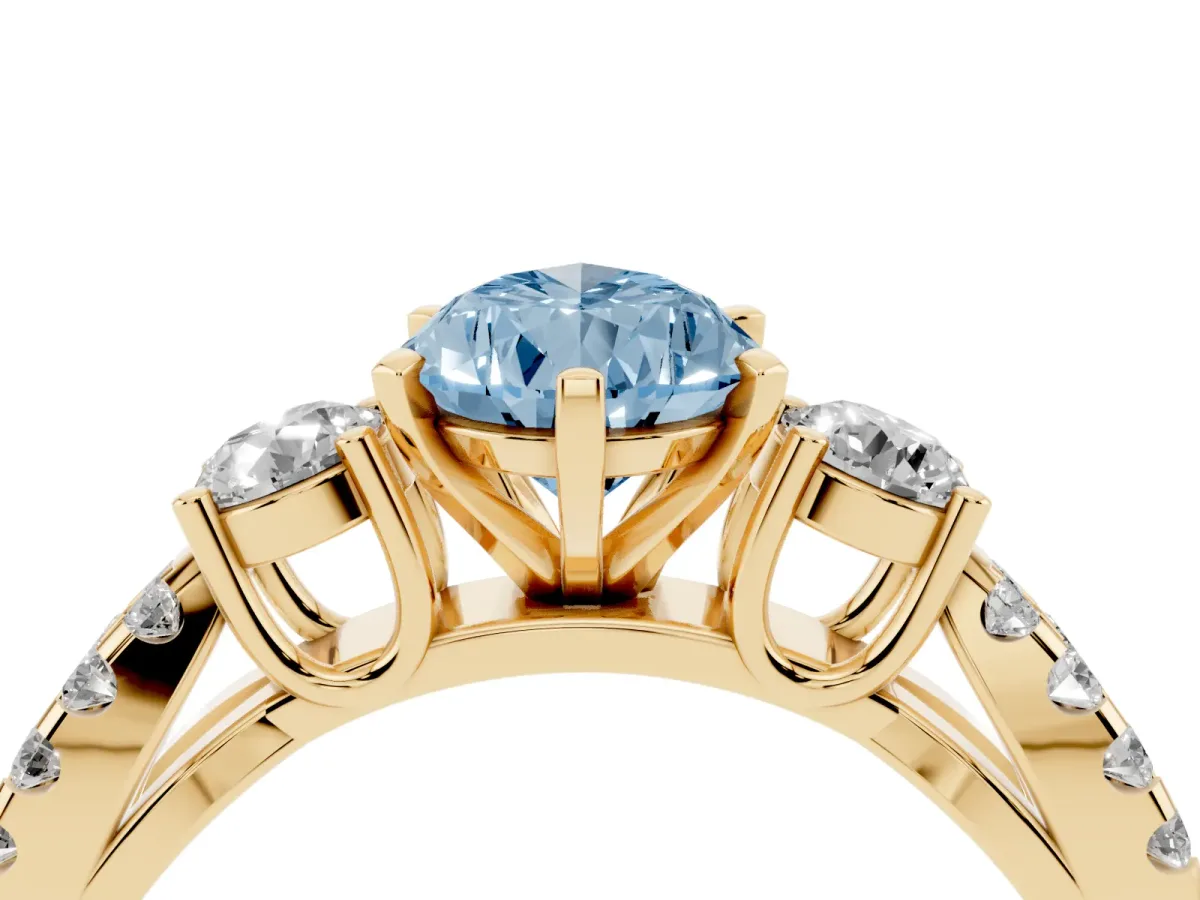 Fancy Blue Pear Cut Diamond Three-Stone Ring with Pavé Split Shank and Four-Prong Setting Yellow gold