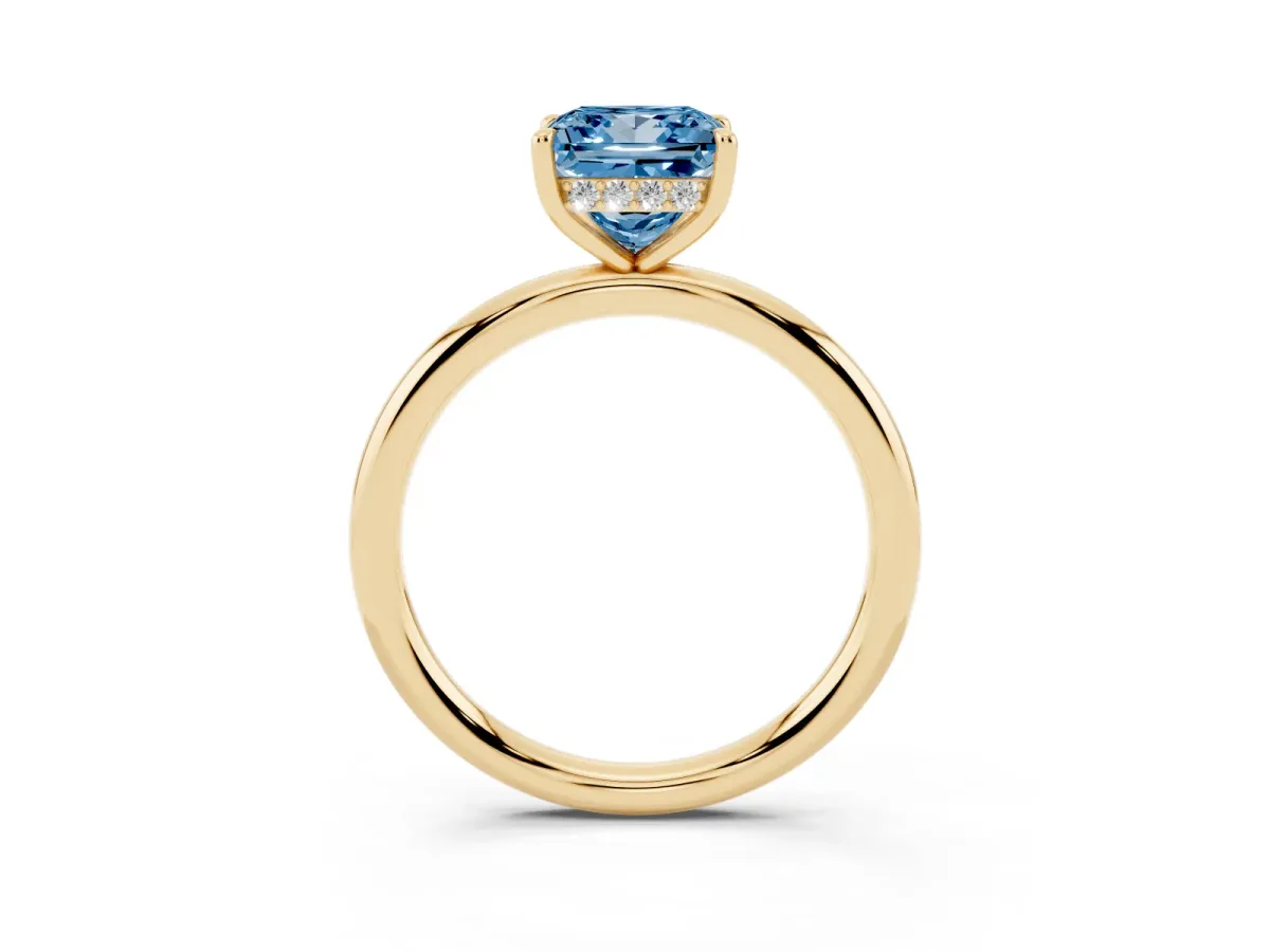 Fancy Blue Princess Cut Diamond Solitaire Ring with Thin Band and Four-Prong Setting Yellow gold