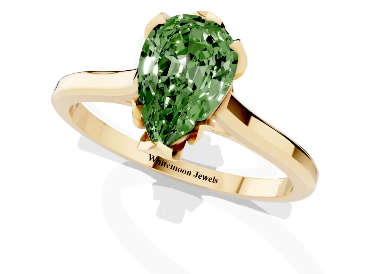 Fancy Green Pear Cut Diamond Solitaire Ring with Flower Prong Setting and Classic Band Yellow gold