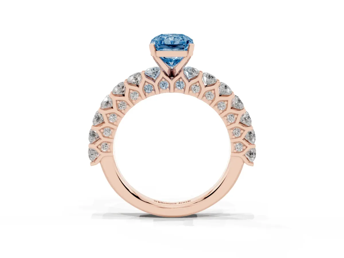 Fancy Blue Radiant Cut Diamond Solitaire Ring with Shared Prong Pavé Band and Four-Prong Setting Rose gold