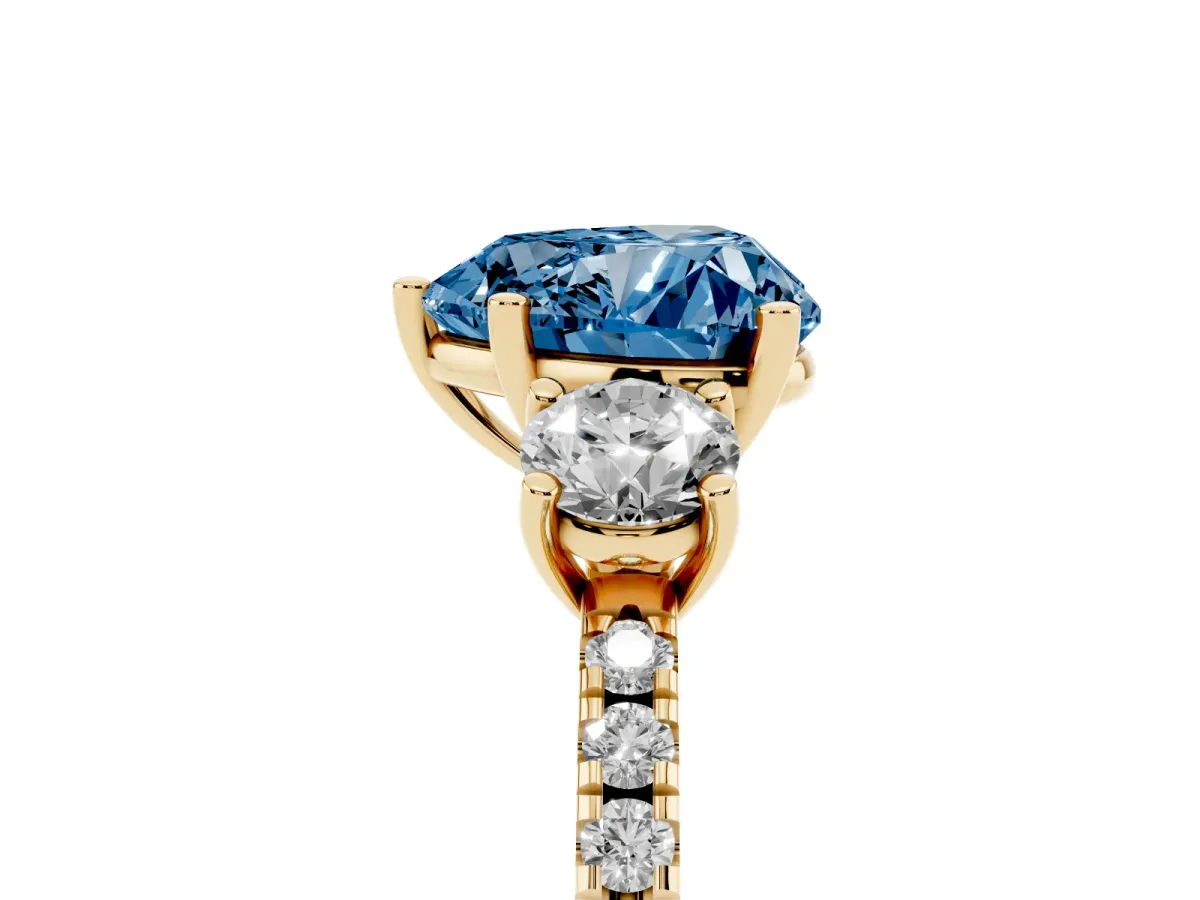 Fancy Blue Three-Stone Heart Cut Cut Diamond Pavé Band with Prong Setting Yellow gold