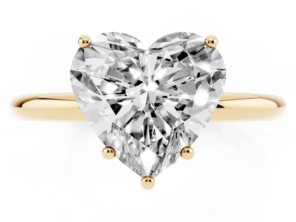 Heart Cut Solitaire Diamond Ring with a Classic Band and Four-Prong Setting Yellow gold
