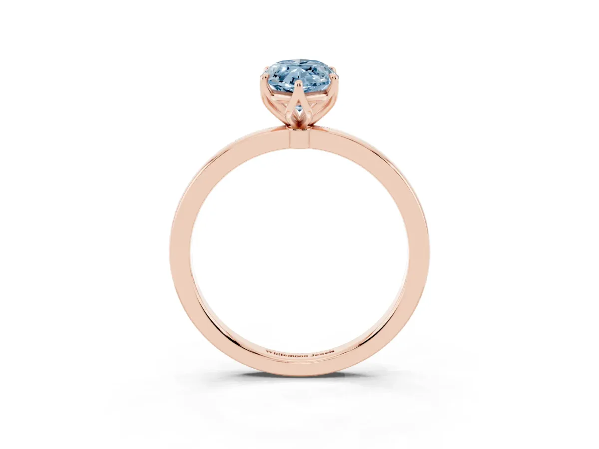 Fancy Blue Marquise Cut Diamond Solitaire Ring with Thin Band and Prong Setting Rose gold