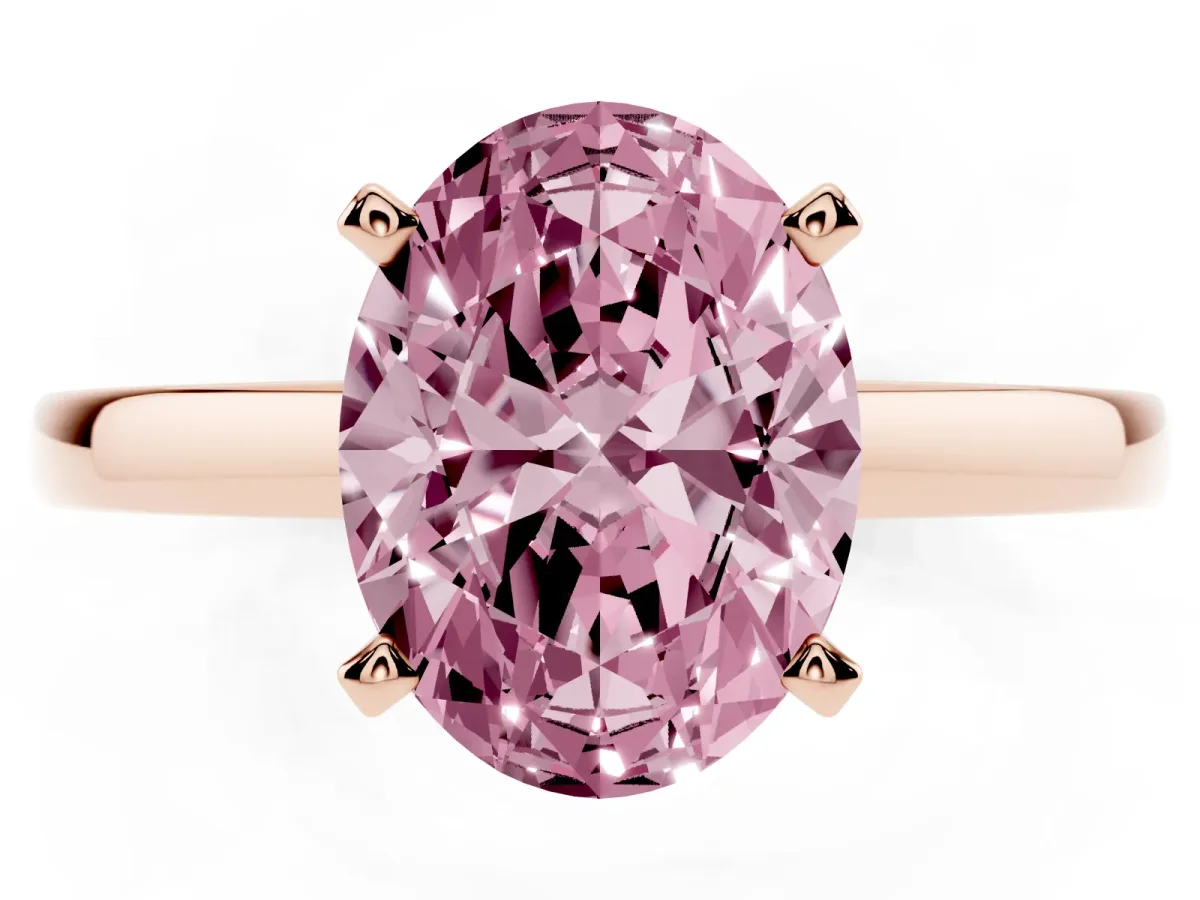 Fancy Pink Oval Cut Solitaire Diamond Engagement Ring with Four-Prong Setting on a Classic Band Rose gold