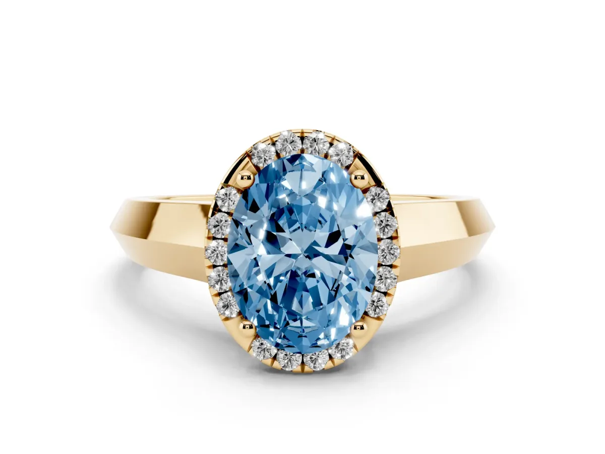 Fancy Blue Oval Cut Halo Diamond Ring with Cathedral Band and Four-Prong Setting Yellow gold