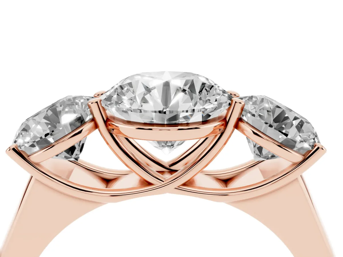 Round Cut Three-Stone Diamond Ring with Prong Setting on a Classic Band Rose gold
