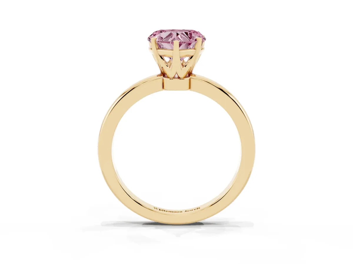 Fancy Pink Heart Cut Solitaire Diamond Ring with Six-Prong Setting on a Classic Band Yellow gold