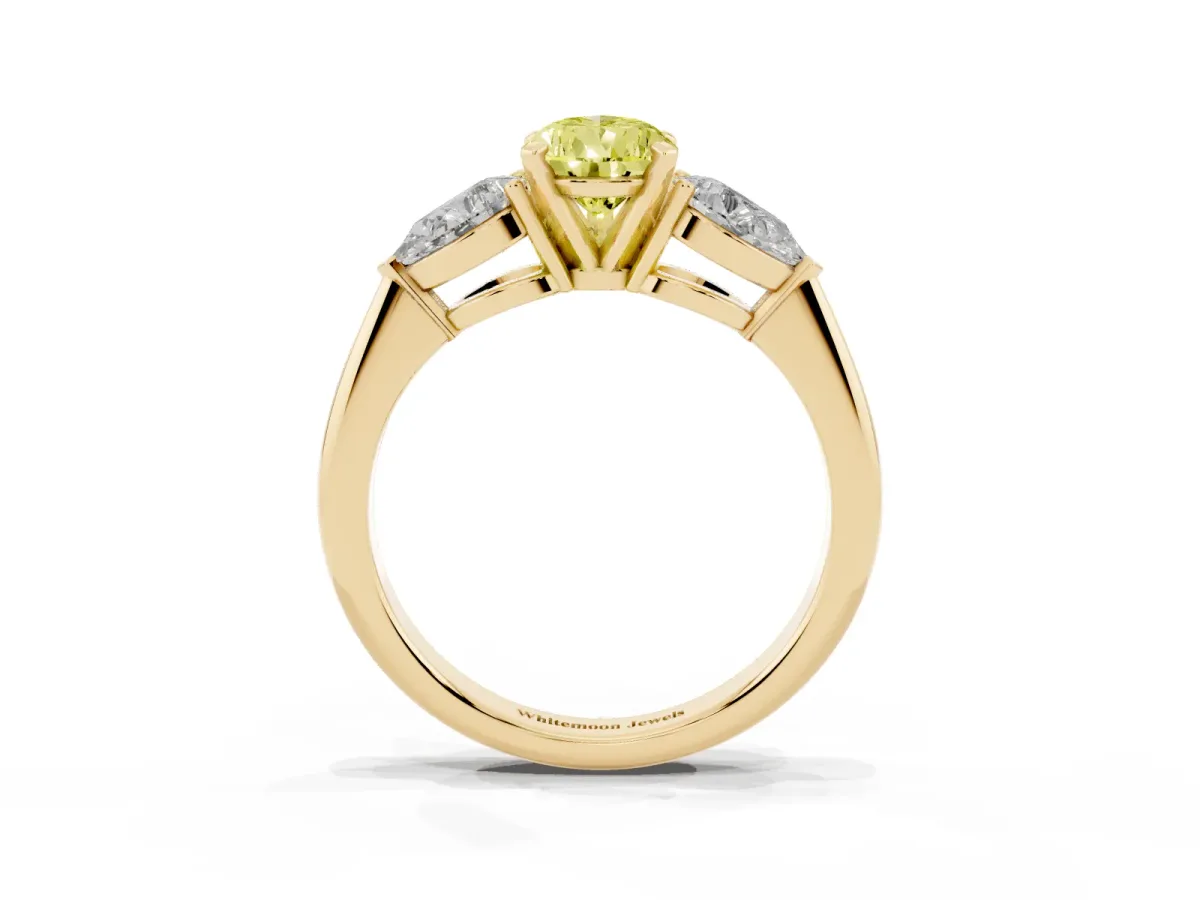 Fancy Yellow Three-Stone Pear Cut Diamond Ring with Pear Side Stones and Four-Prong Setting Yellow gold