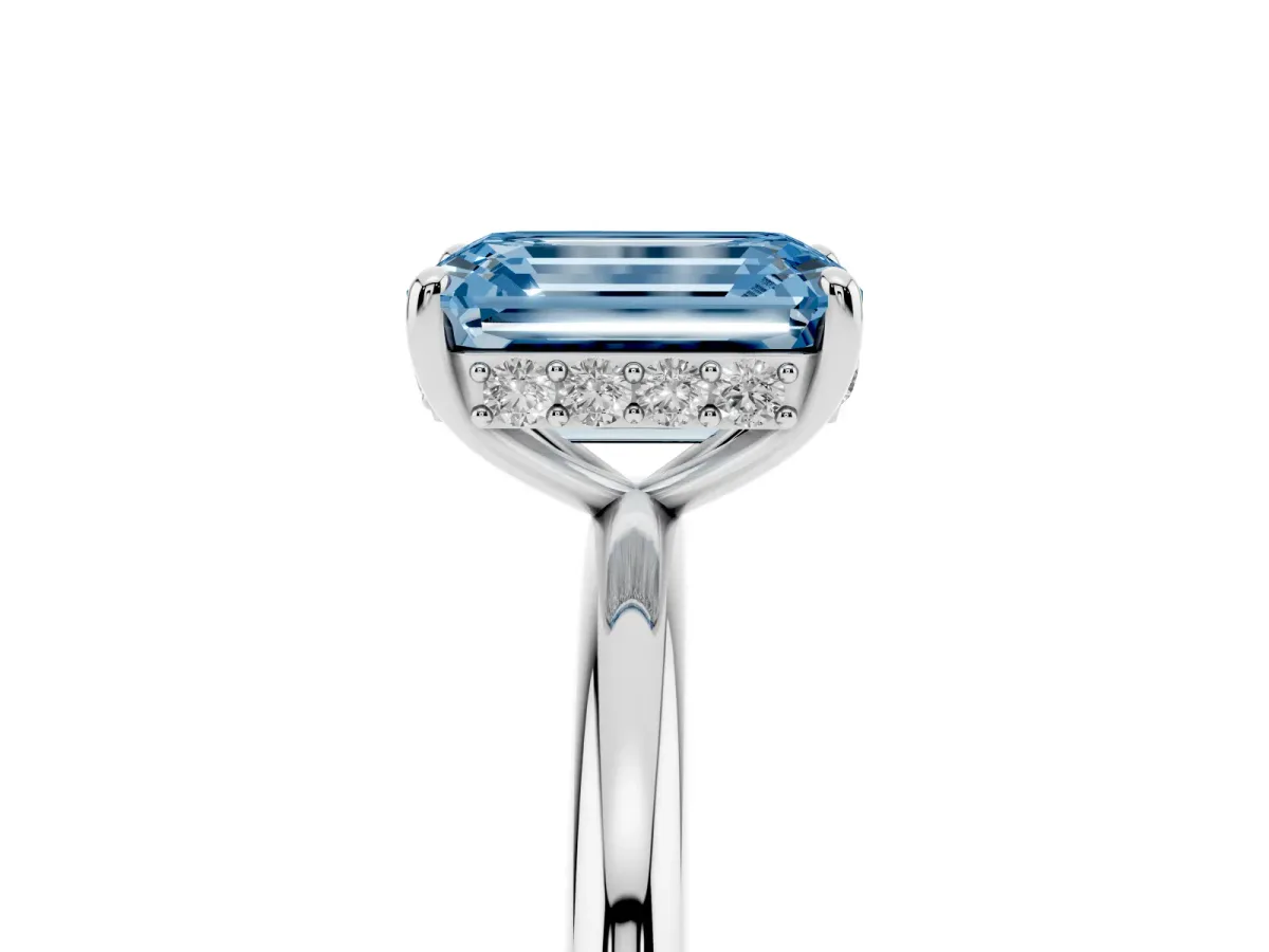 Fancy Blue Emerald Cut Solitaire Diamond Ring with a Classic Band and Four-Prong Setting Platinum