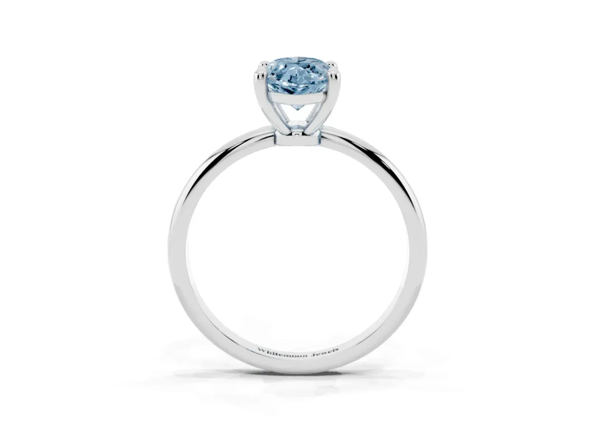 Fancy Blue Marquise Cut Solitaire Diamond Ring with 4-Prong Setting on a Classic Band Silver