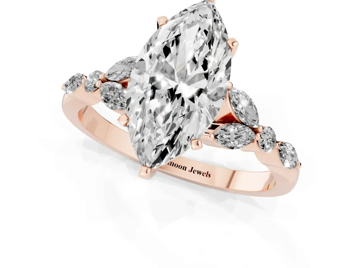 Marquise Cut Diamond Solitaire Ring with Side Stones and Four-Prong Setting Rose gold