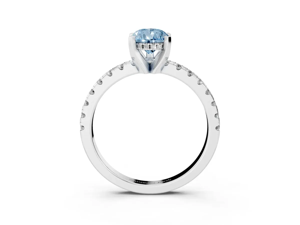 Fancy Blue Pear Cut Diamond Solitaire Ring with Round Pavé Band and Four-Prong Setting Silver