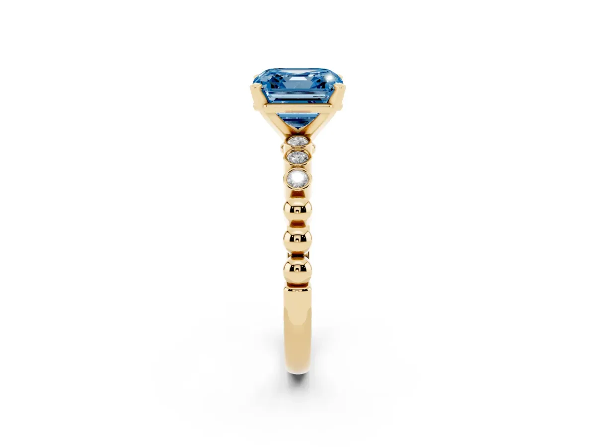Fancy Blue Asscher Cut Solitaire Bezel Accent Diamond Engagement Ring with Beaded Band and Four-Prong Setting Yellow gold