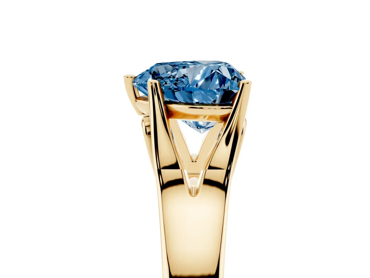 Fancy Blue Heart Cut Solitaire Diamond Ring with Cathedral Band and Four-Prong Setting Yellow gold
