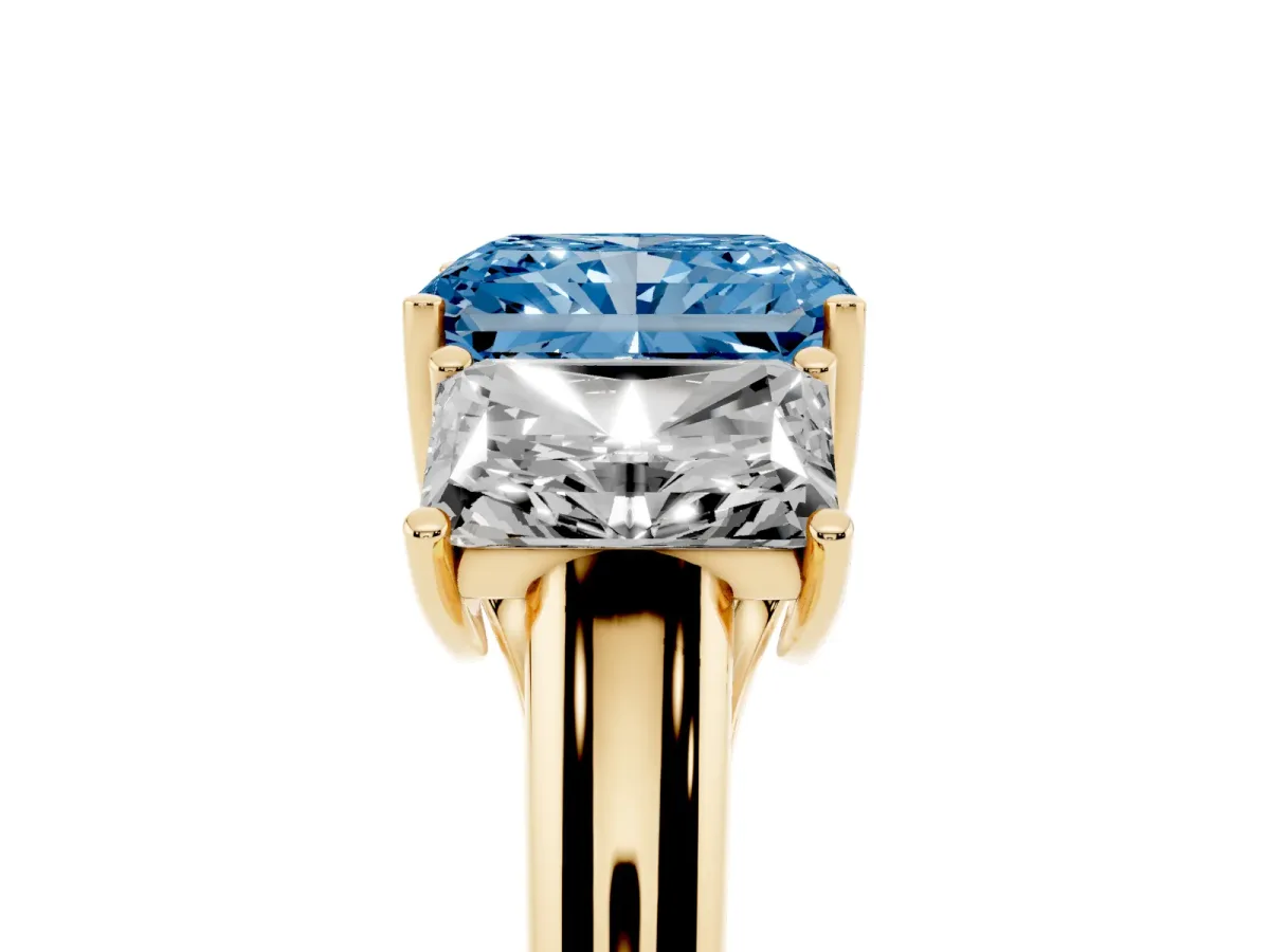 Fancy Blue Three-Stone Radiant Cut Diamond Engagement Ring with Prong Setting Yellow gold