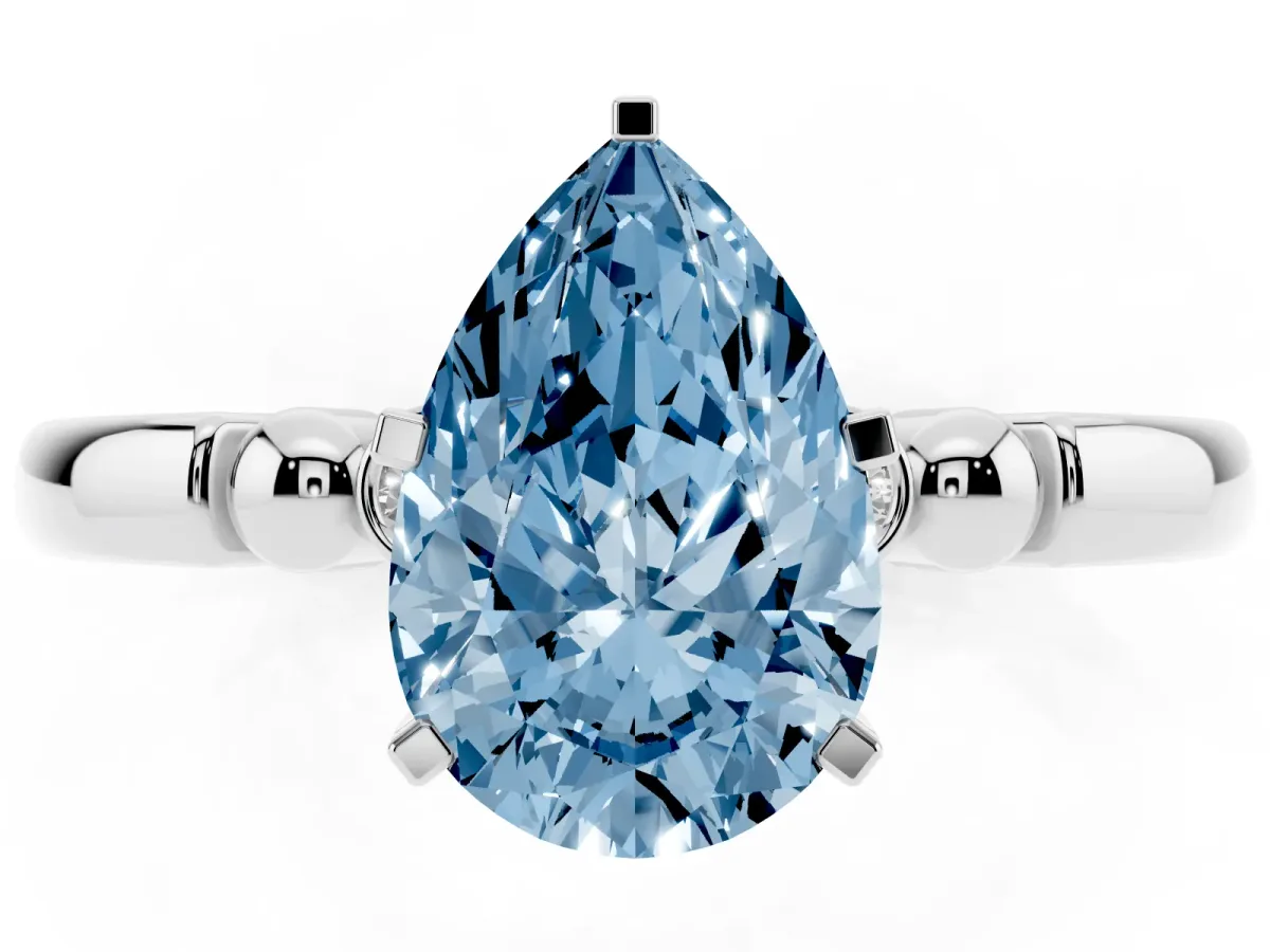 Fancy Blue Pear Cut Solitaire Beaded Band with Four-Prong Setting Silver