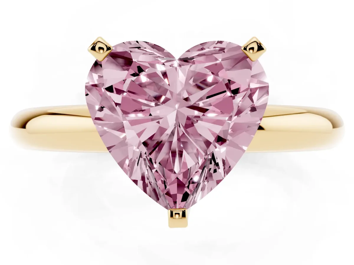 Fancy Pink Heart Cut Diamond Solitaire Engagement Ring with Round Band and Four-Prong Setting Yellow gold
