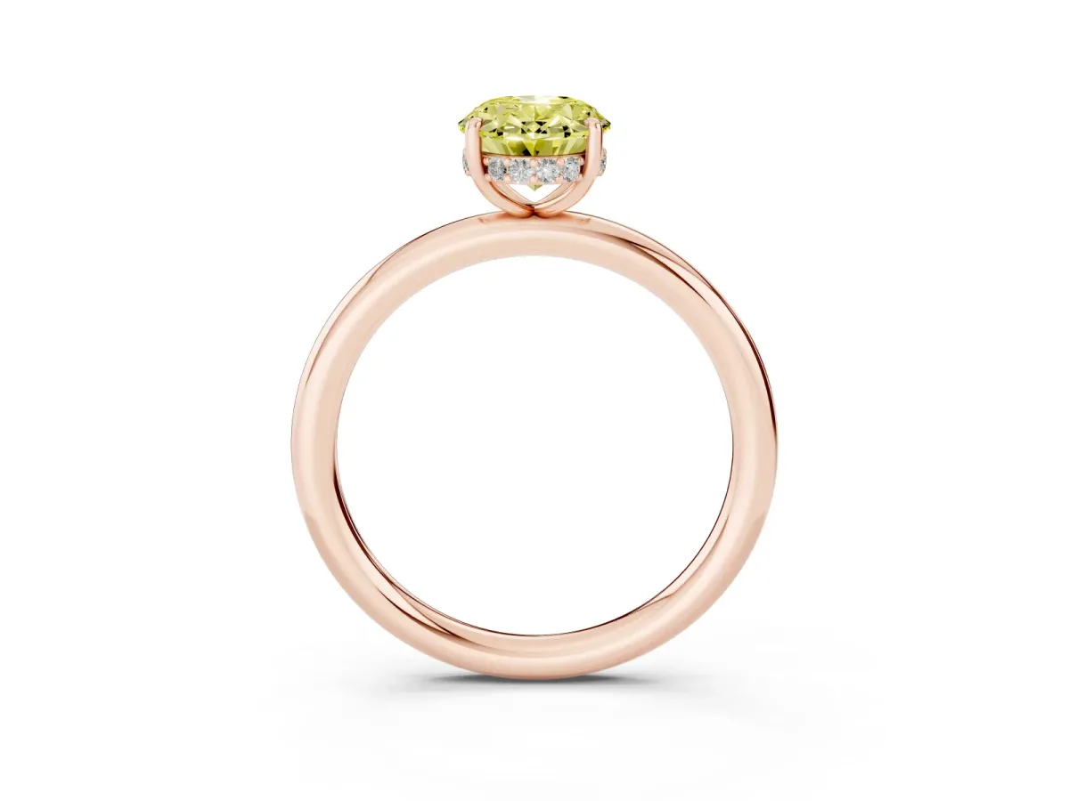 Fancy Yellow Oval Cut Diamond Solitaire Ring with Thin Band and Four-Prong Setting Rose gold