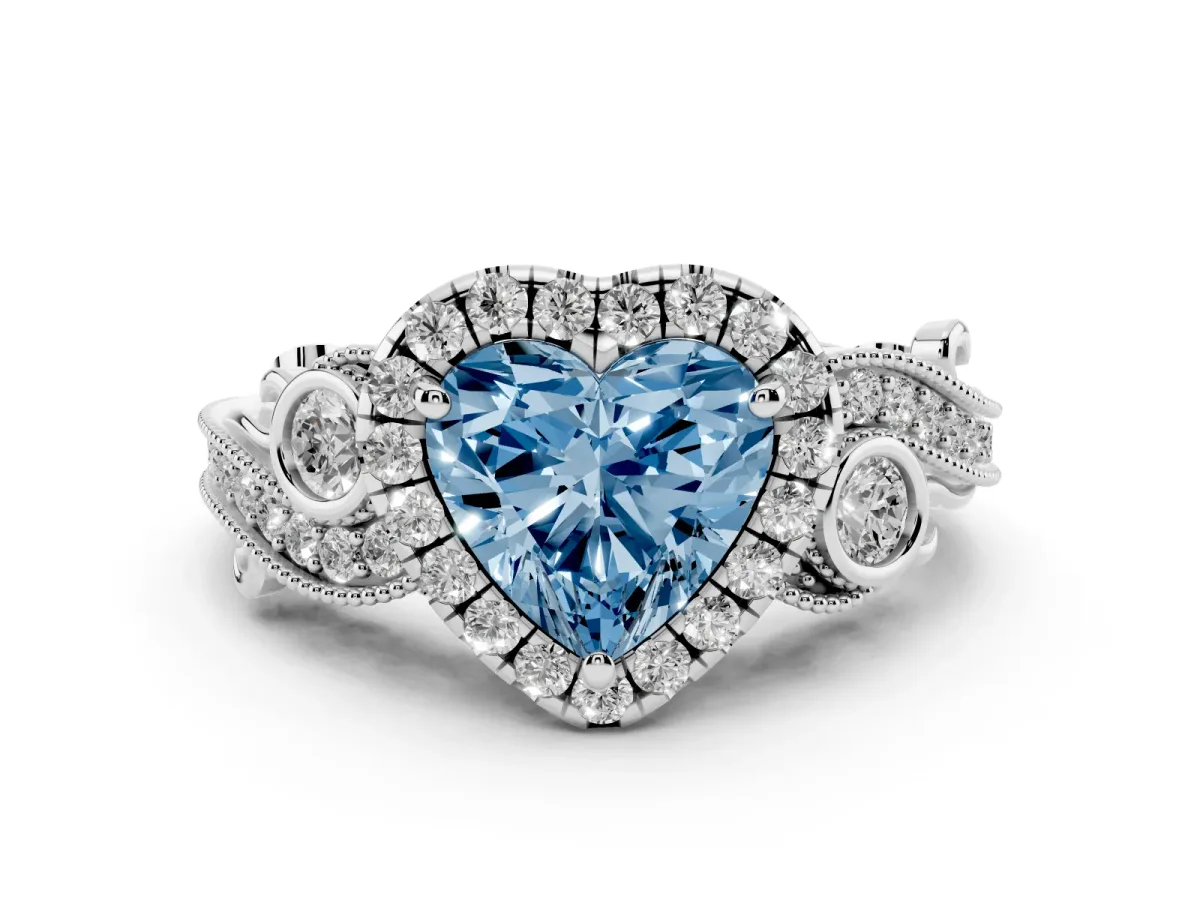 Fancy Blue Heart Cut Halo Diamond Ring with Milgrain and Bezel Accents on a Split Shank Band Platinum