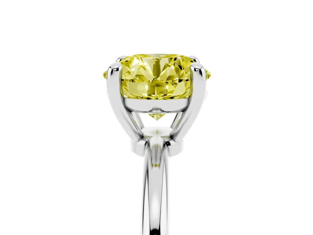 Fancy Yellow Round Cut Solitaire Diamond Ring with 4-Prong Setting on a Classic Band Silver