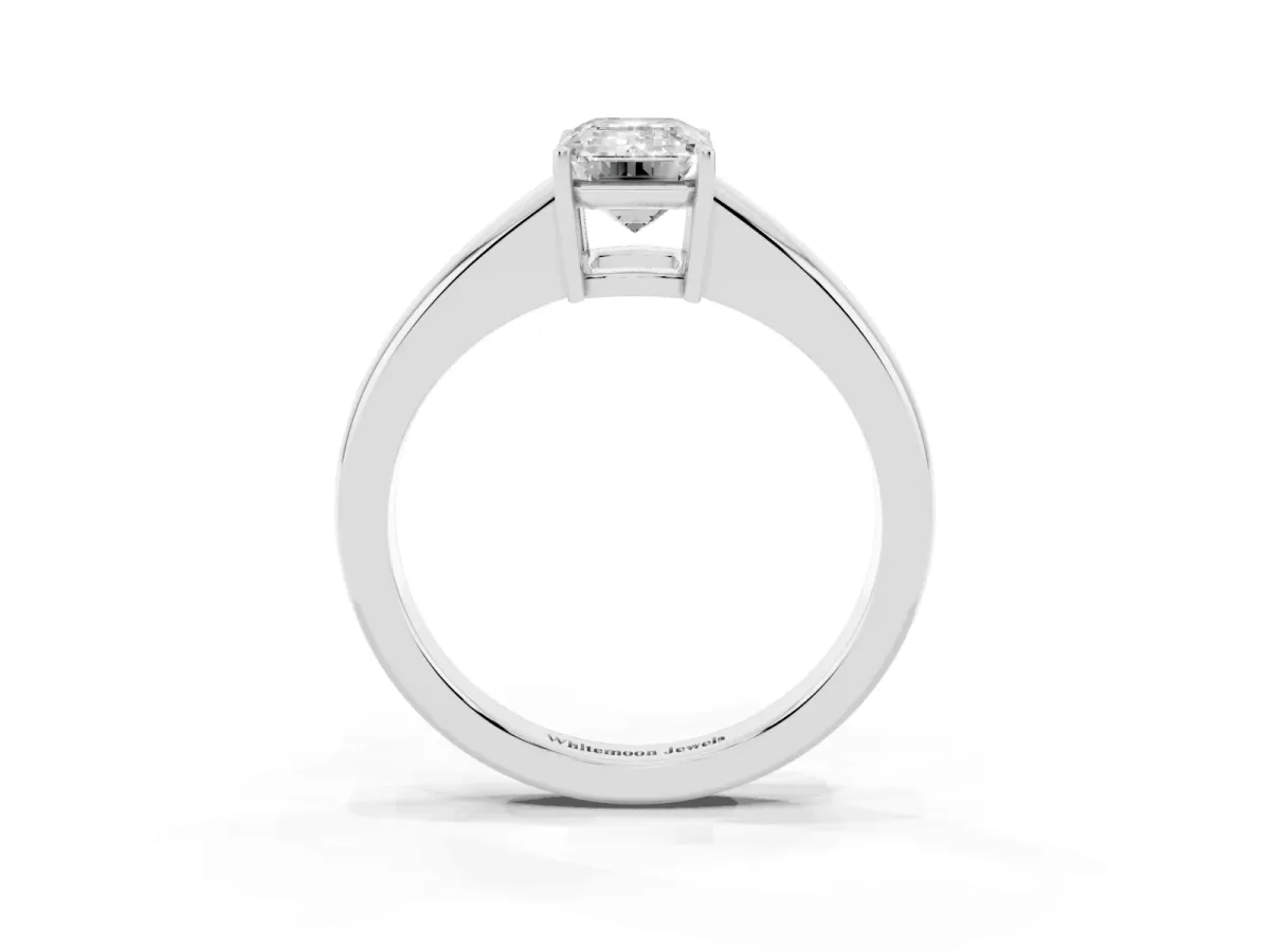 Emerald Cut Solitaire Diamond Ring with Tapered Band and Four-Prong Setting White gold