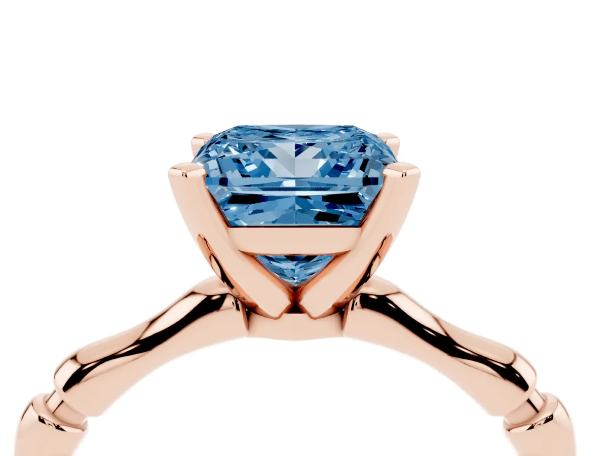 Fancy Blue Princess Cut Solitaire Diamond Ring with Bamboo Band and Four-Prong Setting Rose gold