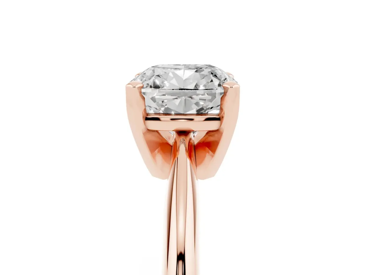 Cushion Cut Cut Solitaire Ring with Four-Prong Setting on a Classic Band Rose gold