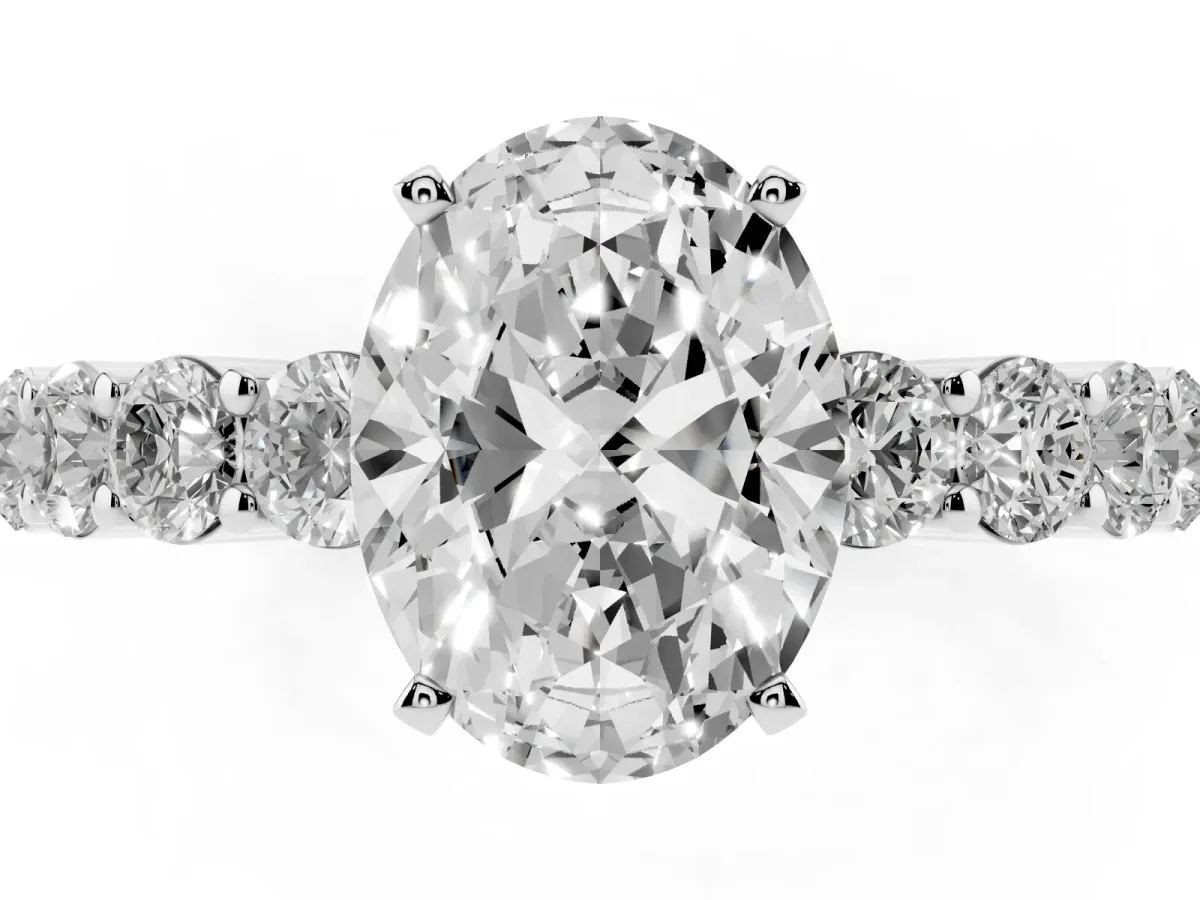 Oval Cut Diamond Solitaire Ring with Shared Prong Round Side Stones Silver