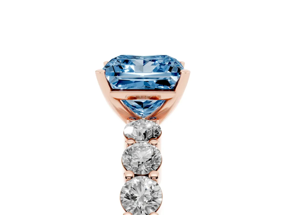 Fancy Blue Princess Cut Diamond Solitaire Ring with Shared Prong Round Side Stones Rose gold