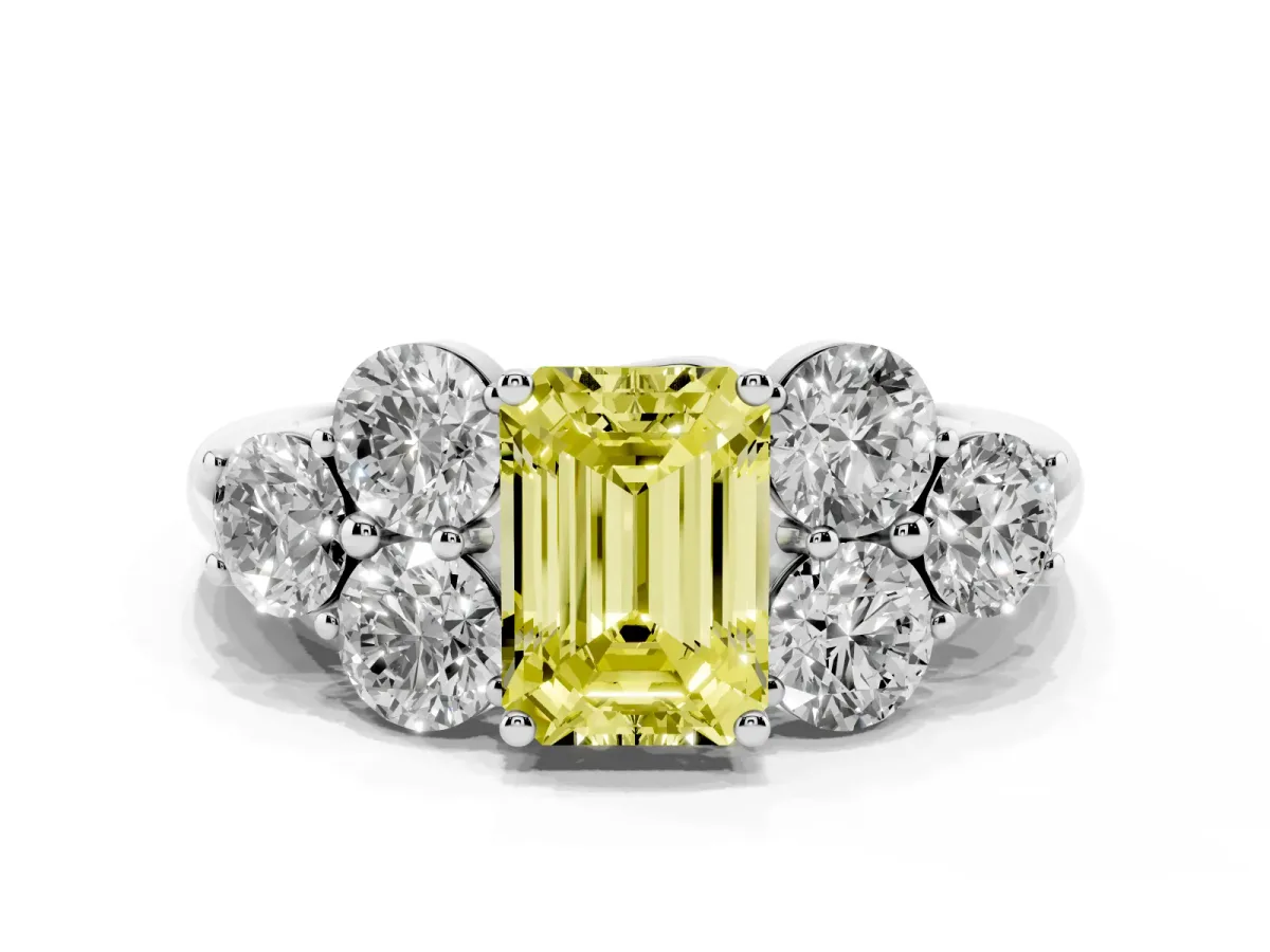 Fancy Yellow Emerald Cut Cut Diamond Cluster Ring with Round Accent Stones and Prong Setting on a Classic Band Silver