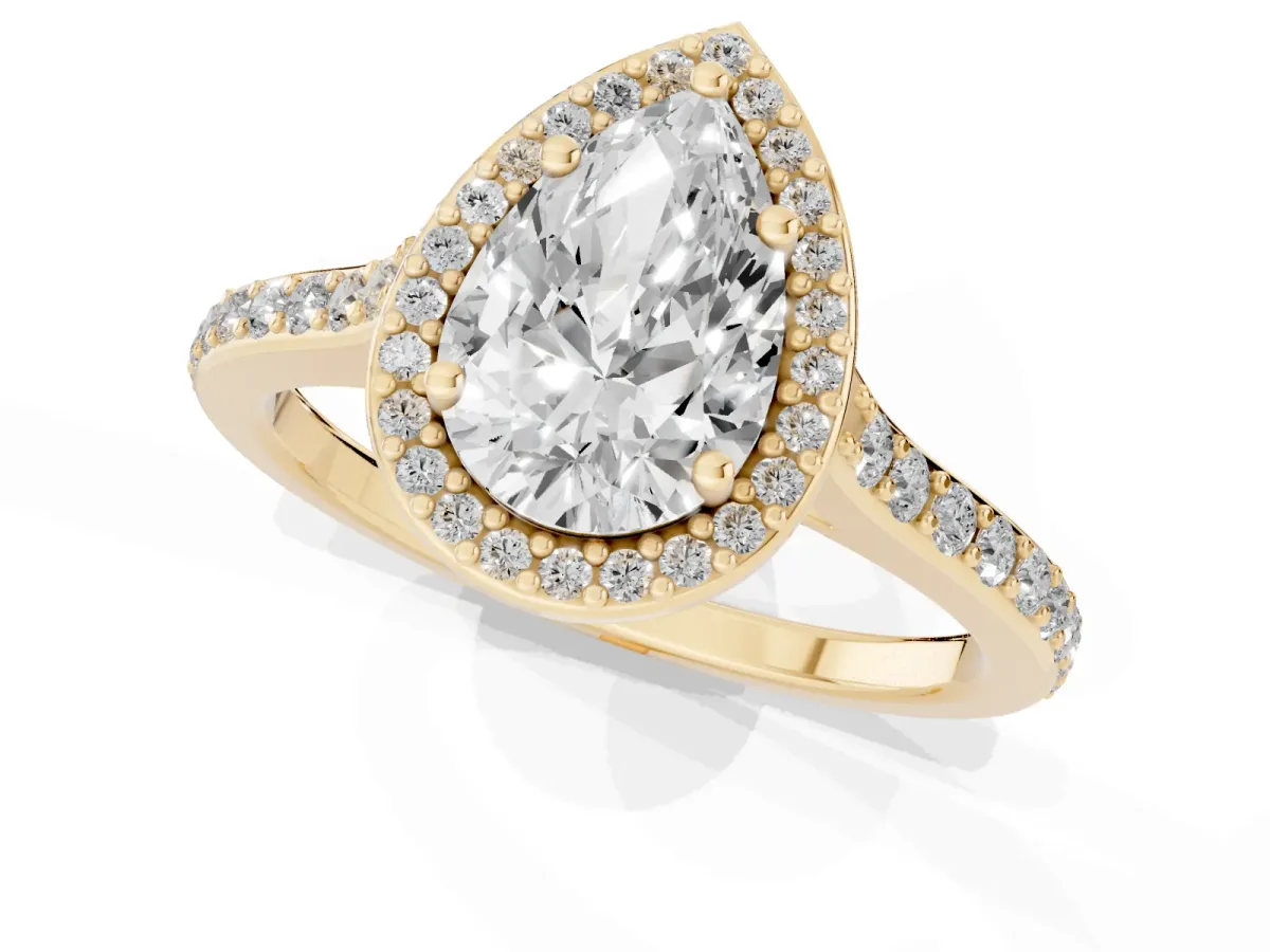 Pear Cut Diamond Halo Engagement Ring with Round Pavé Shoulders and Prong Setting Yellow gold