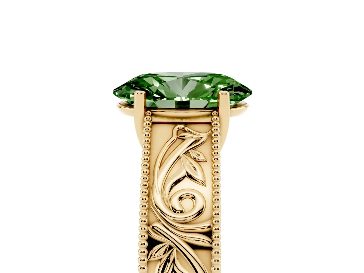 Fancy Green Oval Cut Diamond Solitaire Ring with Engraved Band and Four-Prong Setting Yellow gold