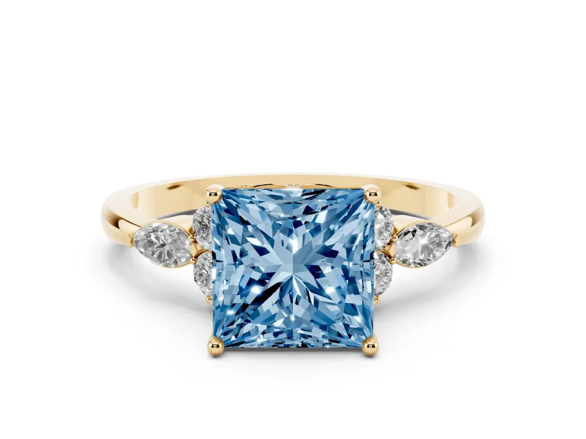 Fancy Blue Princess Cut Brilliant Diamond Solitaire Ring with Pear Side Stones and Four-Prong Setting Yellow gold