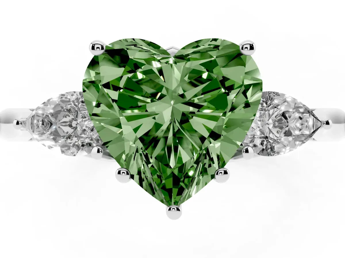 Fancy Green Three-Stone Heart Cut Brilliant Diamond Solitaire Ring with Tapered Band and Four-Prong Setting Silver