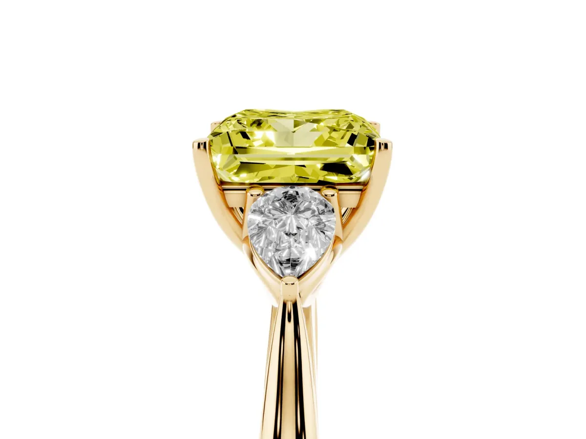 Fancy Yellow Three-Stone Princess Cut Diamond Ring with Pear Side Stones in Four-Prong Setting Yellow gold