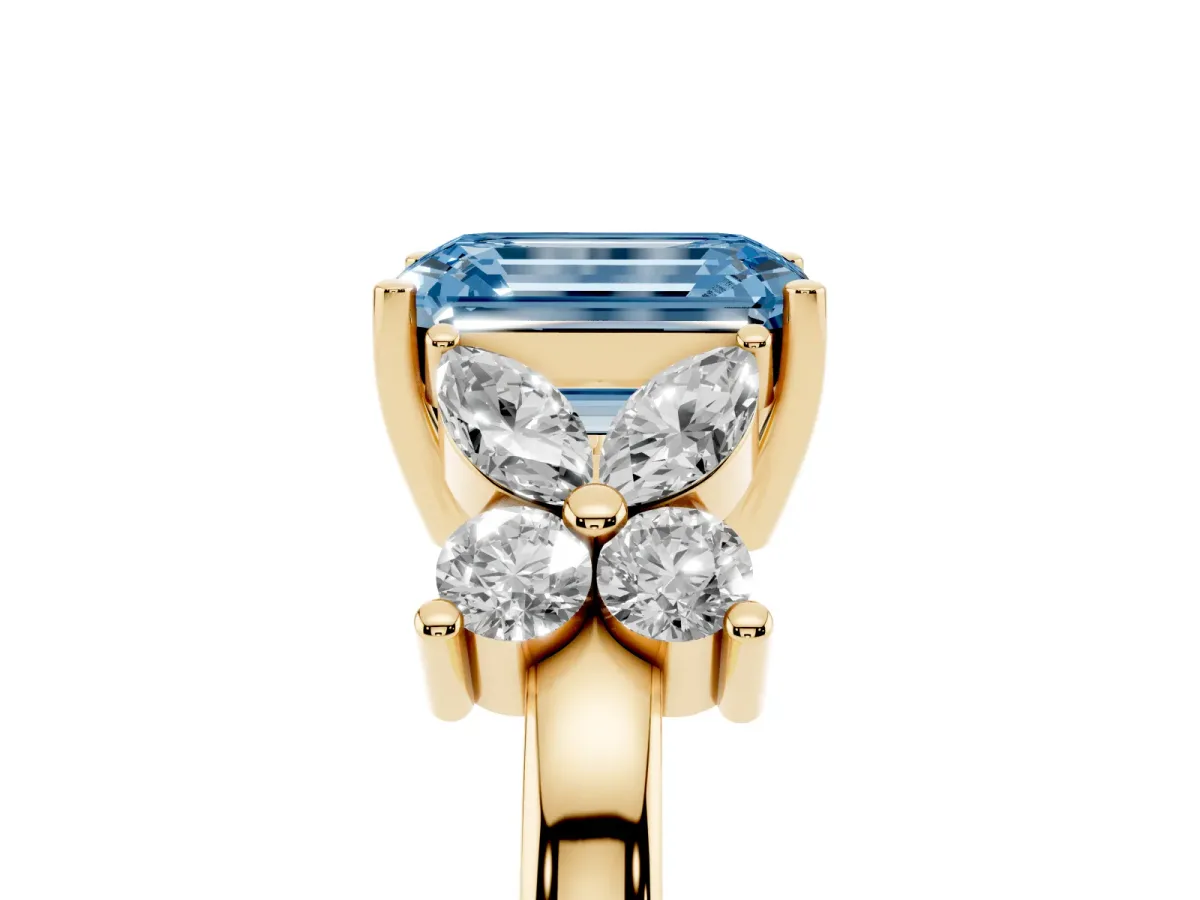 Fancy Blue Emerald Cut Diamond Floral Cluster Ring with Solitaire Band and Prong Setting Yellow gold